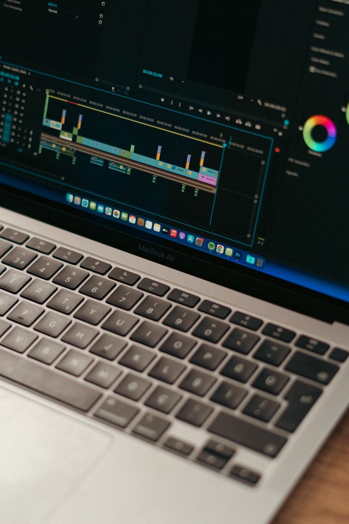The Art of Drawing Readers In: Your attractive post title goes here Detailed view of video editing software interface on a MacBook Air.